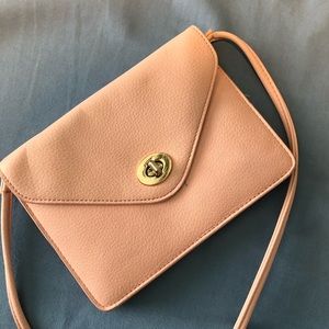 Small pink pouch purse